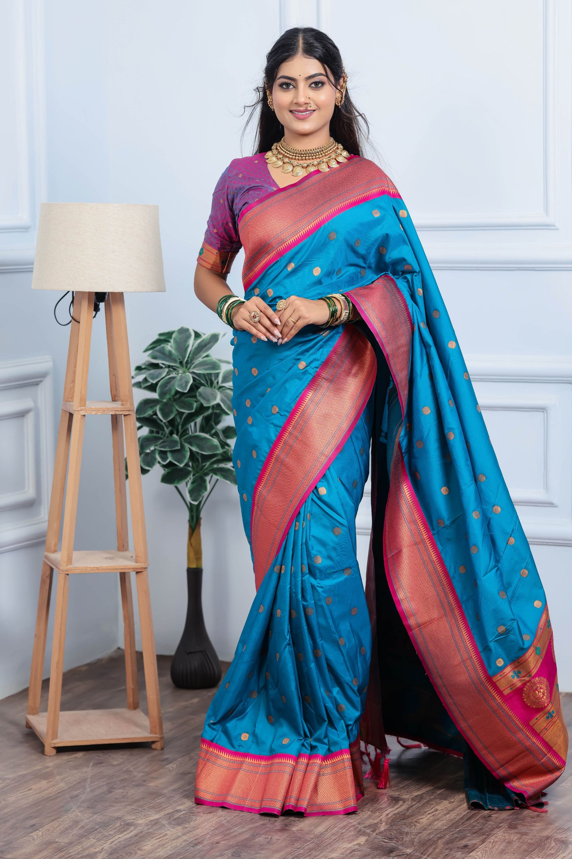 Teal Blue Kanjivaram Silk Saree with Pink Border Gold Zari Butti Work