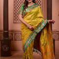 Yellow Silk Saree with Green Border Floral Zari Work Traditional Saree