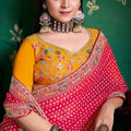 Pink Bandhej Georgette Saree and Yellow Designer Blouse