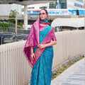 Teal Blue Banarasi Patola Silk Saree with Pink Zari Border Pallu