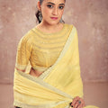 Pastel Yellow Georgette Saree with Embroidered Blouse Lace Border