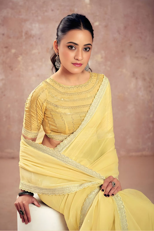Pastel Yellow Georgette Saree with Embroidered Blouse Lace Border