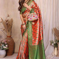 Orange And Green Banarasi Silk Saree with Zari Weaving and Contrast Blouse