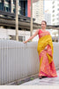 Yellow Banarasi Silk Saree with Pink Woven Border Festive Wear Saree