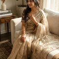 Beige Tissue Silk Saree with Delicate Embroidery and Designer Border