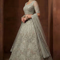 Graceful Pista Green Embroidered Sequins Net Lehenga Choli with Dupatta for Women