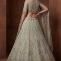 Graceful Pista Green Embroidered Sequins Net Lehenga Choli with Dupatta for Women