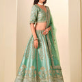 Graceful Sea Green Embroidered Art Silk Lehenga Choli with Dupatta for Wedding