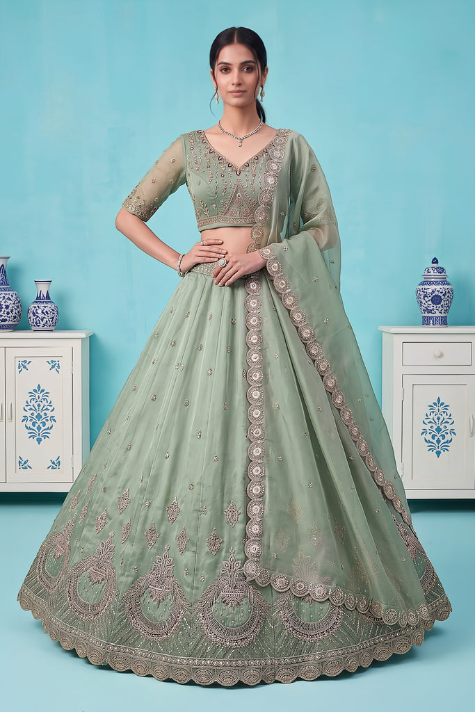 Graceful Pista Green Chandnia Silk Heavy Designer Lehenga Choli with Multi Thread Work