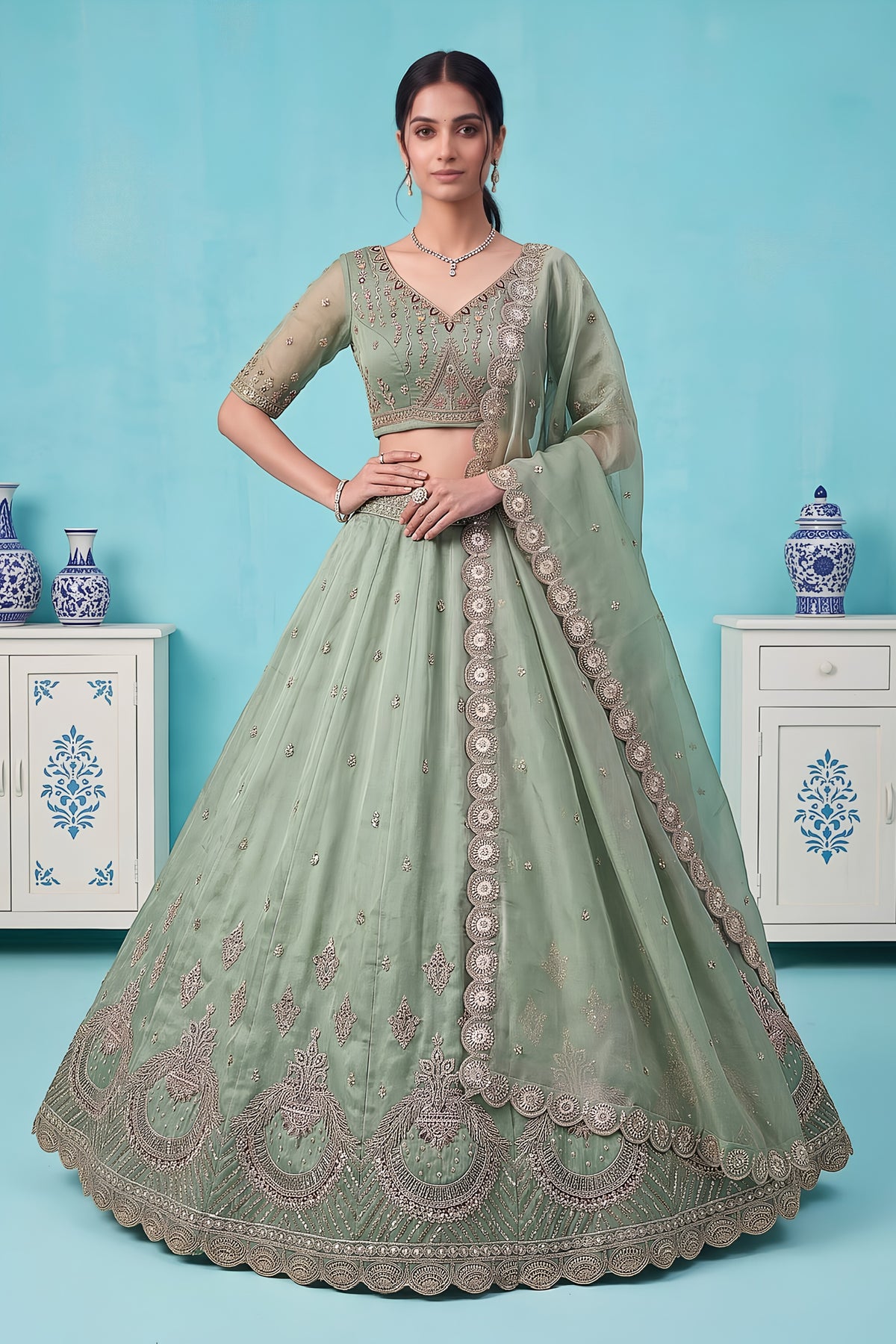 Graceful Pista Green Chandnia Silk Heavy Designer Lehenga Choli with Multi Thread Work