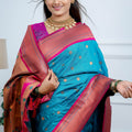 Teal Blue Kanjivaram Silk Saree with Pink Border Gold Zari Butti Work