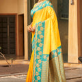 Yellow Silk Saree with Teal Green Contrast Border Floral Zari Work