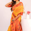 Yellow Paithani Silk Saree with Orange Zari Border and Traditional