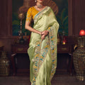 Light Green Silk Saree with Zari Embroidery and Mustard Blouse