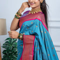 Teal Blue Kanjivaram Silk Saree with Pink Border Gold Zari Butti Work