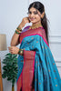 Teal Blue Kanjivaram Silk Saree with Pink Border Gold Zari Butti Work