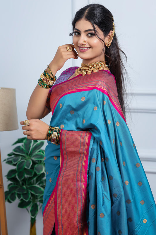 Teal Blue Kanjivaram Silk Saree with Pink Border Gold Zari Butti Work