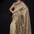 Gold Shimmer Silk Saree with Heavy Zari Stone Embroidered Border