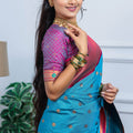 Teal Blue Kanjivaram Silk Saree with Pink Border Gold Zari Butti Work