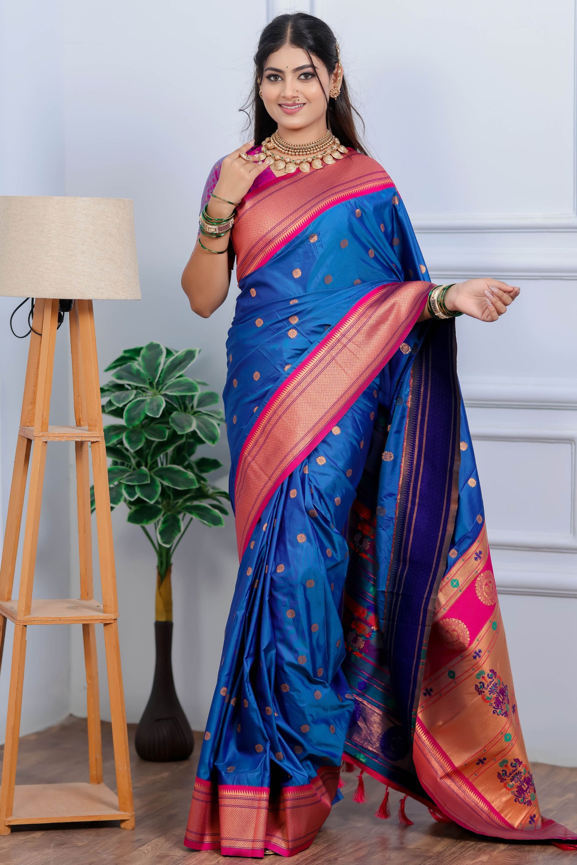 Royal Blue Kanjivaram Silk Saree with Pink Border Gold Zari Butti Work
