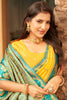 Yellow Silk Saree with Teal Green Contrast Border Floral Zari Work