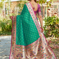 Bottle Green Silk Saree Pink Border Multicolor Peacock Zari Weaving Work