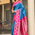 Elegant Sky Blue Silk Saree with Pink Contrast Border Floral Zari Work