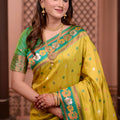 Yellow Silk Saree with Green Border Floral Zari Work Traditional Saree