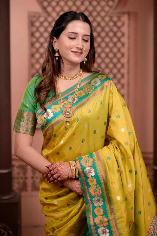 Yellow Silk Saree with Green Border Floral Zari Work Traditional Saree