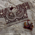 Beige Tissue Silk Saree with Delicate Embroidery and Designer Border