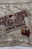 Beige Tissue Silk Saree with Delicate Embroidery and Designer Border