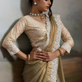 Gold and Pastel Green Silk Saree with White Lace Border