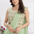 Pastel Green Designer Saree with Floral Embroidered Blouse