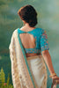Cream Banarasi Silk Saree with Teal Blue Embroidered Blouse