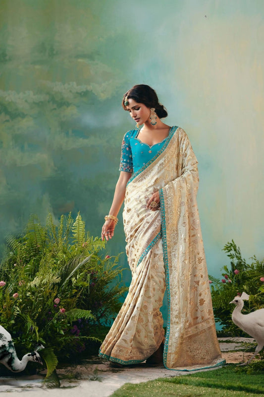  Cream Banarasi Silk Saree with Teal Blue Embroidered Blouse