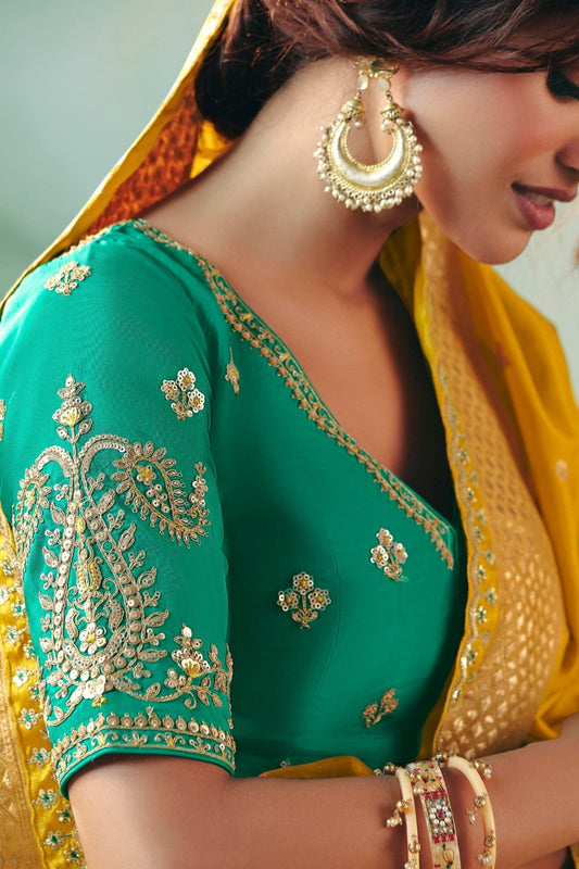 Mustard Yellow Silk Saree Teal Green Embroidered Blouse