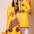 Vibrant Yellow Rayon Couple Navratri Outfit with Kutchi Mirror and Elephant Embroidery