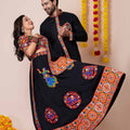 Couple Black Gujarati Embroidered Navratri Chaniya Choli and Kurta Set with Mirror Work