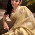 Elegant Golden Banarasi Silk Saree with Zari Weaving Festive Wear