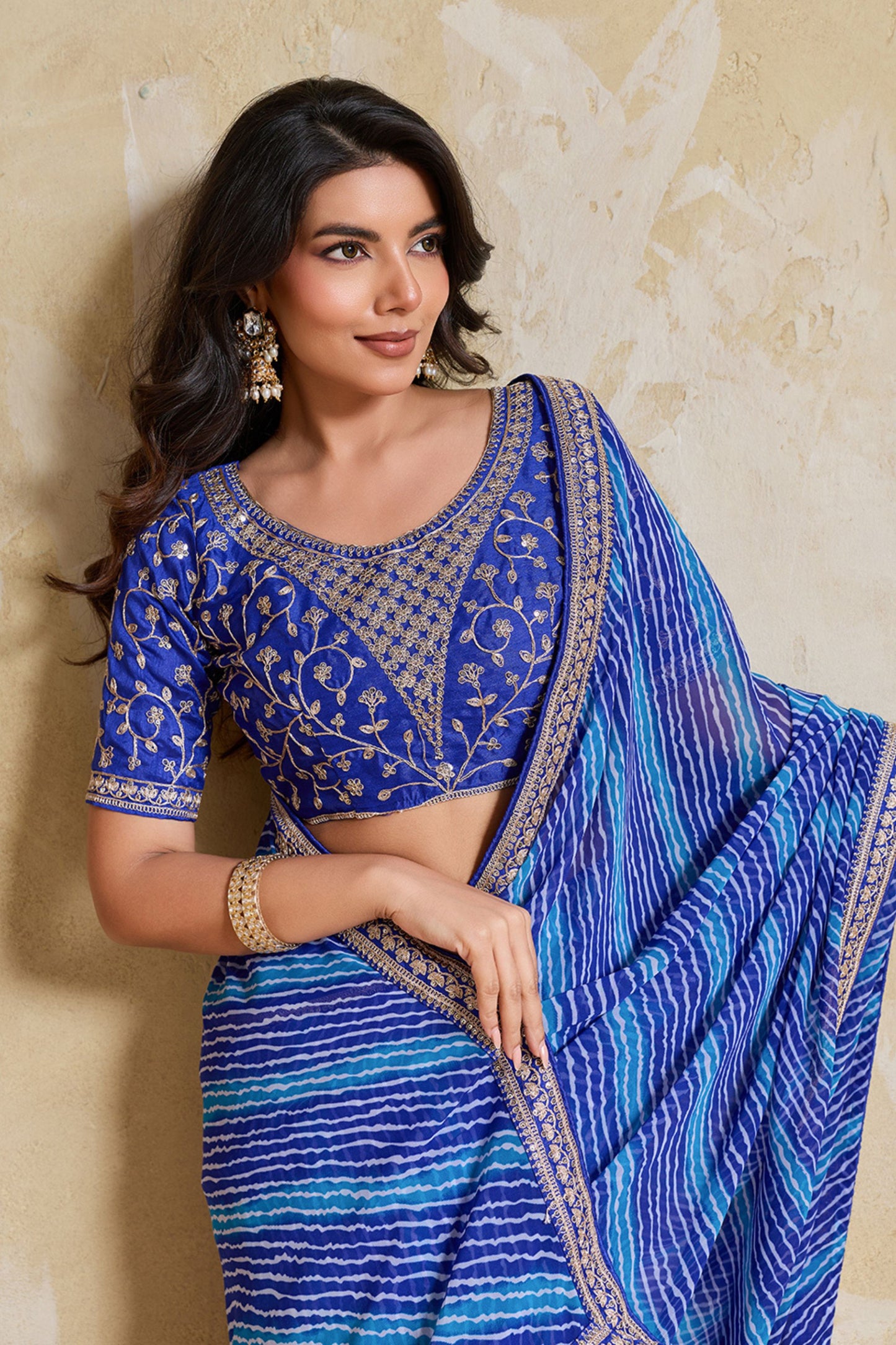 Blue Georgette Saree with Golden Embroidered Border Designer Blouse