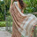 Beige Linen Cotton Saree with Floral Embroidery Woven Border