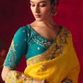 Yellow Floral Embroidered Silk Saree with Contrast Teal Blouse