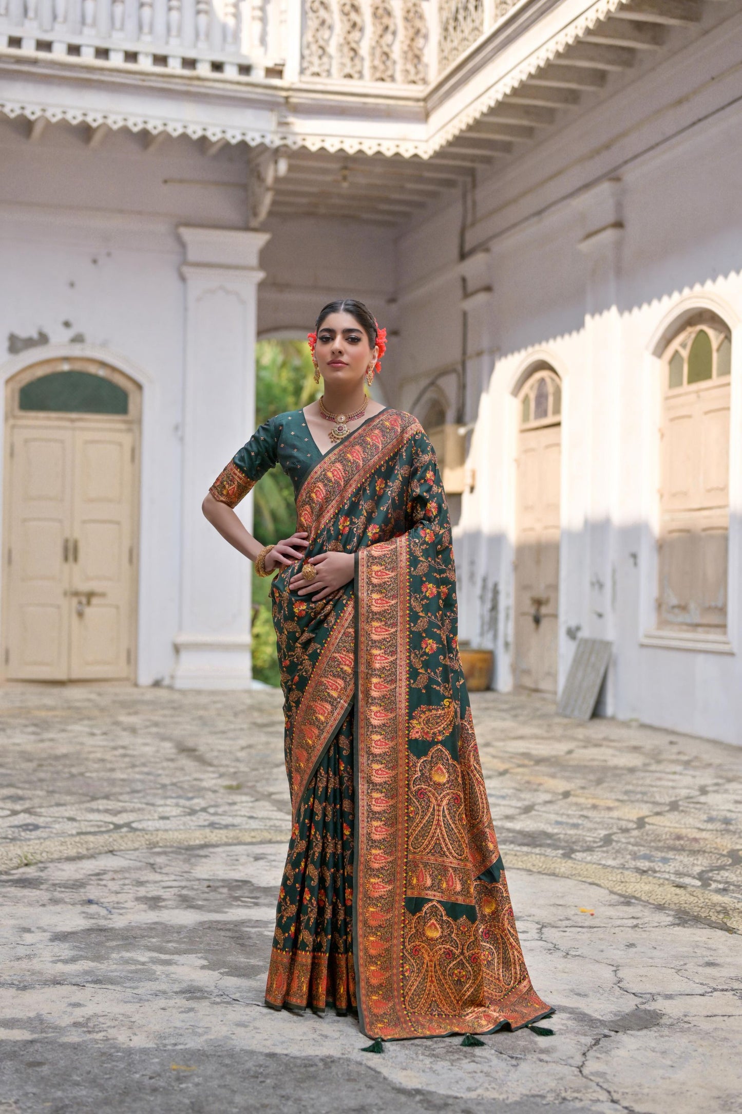 Dark Green Traditional Silk Saree with Rich Paisley Border