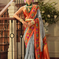 Blue Banarasi Silk Saree Floral Woven Border Red Zari Pallu 