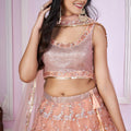 Stunning Peach Pink Sequins Embroidered Soft Net Lehenga Choli with Dupatta for Women