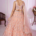 Stunning Peach Pink Sequins Embroidered Soft Net Lehenga Choli with Dupatta for Women