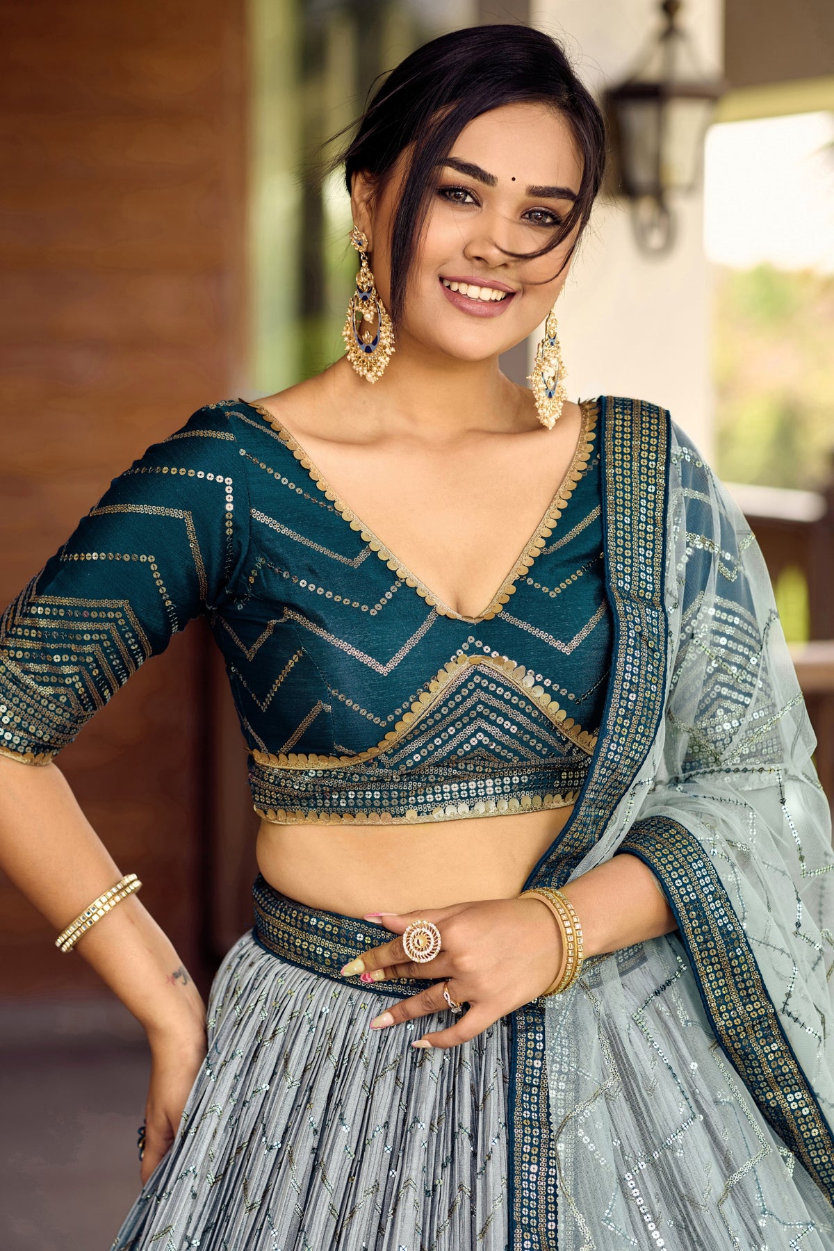 Adorable Teal Blue Chinon Designer Lehenga Choli Set with Sequin Work and Matching Dupatta
