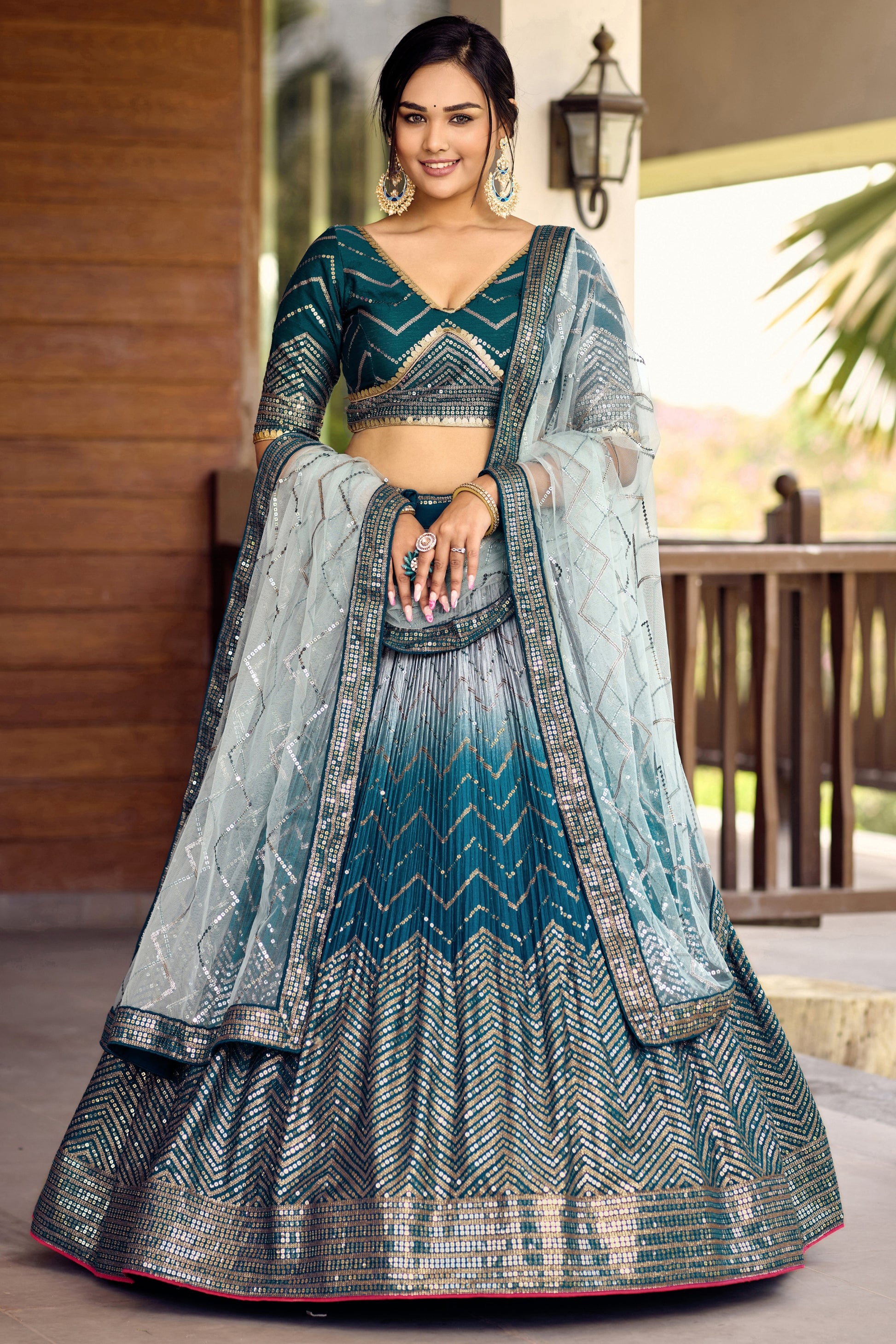 Adorable Teal Blue Chinon Designer Lehenga Choli Set with Sequin Work and Matching Dupatta