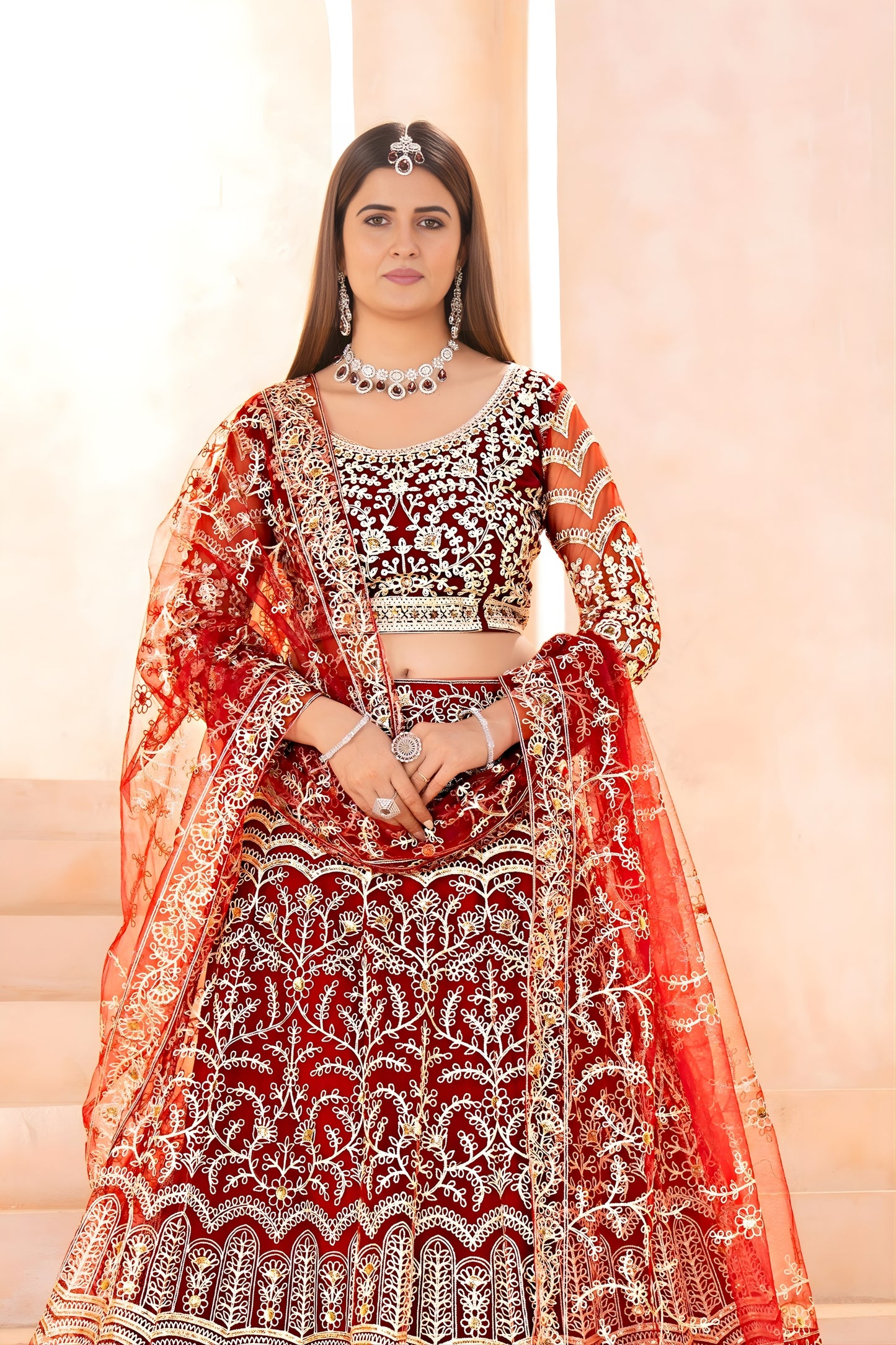 Luxurious Maroon Heavy Embroidered Butterfly Net Lehenga Choli with Dupatta