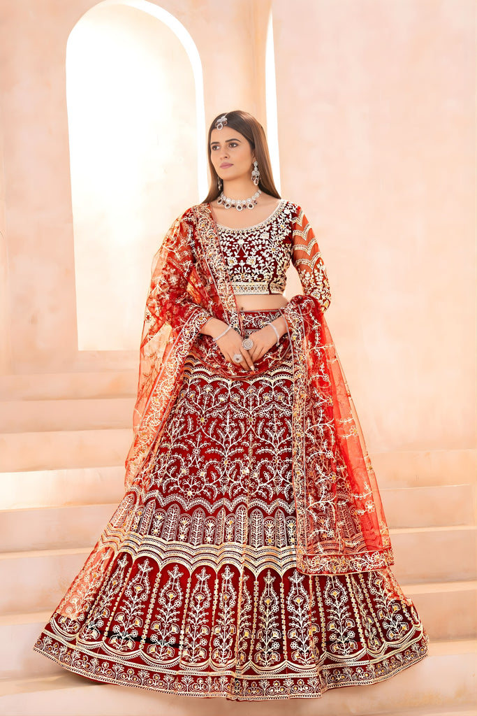 Luxurious Maroon Heavy Embroidered Butterfly Net Lehenga Choli with Dupatta